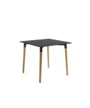 Mesa de comedor redonda fija con patas de madera y sobre de MDF lacado